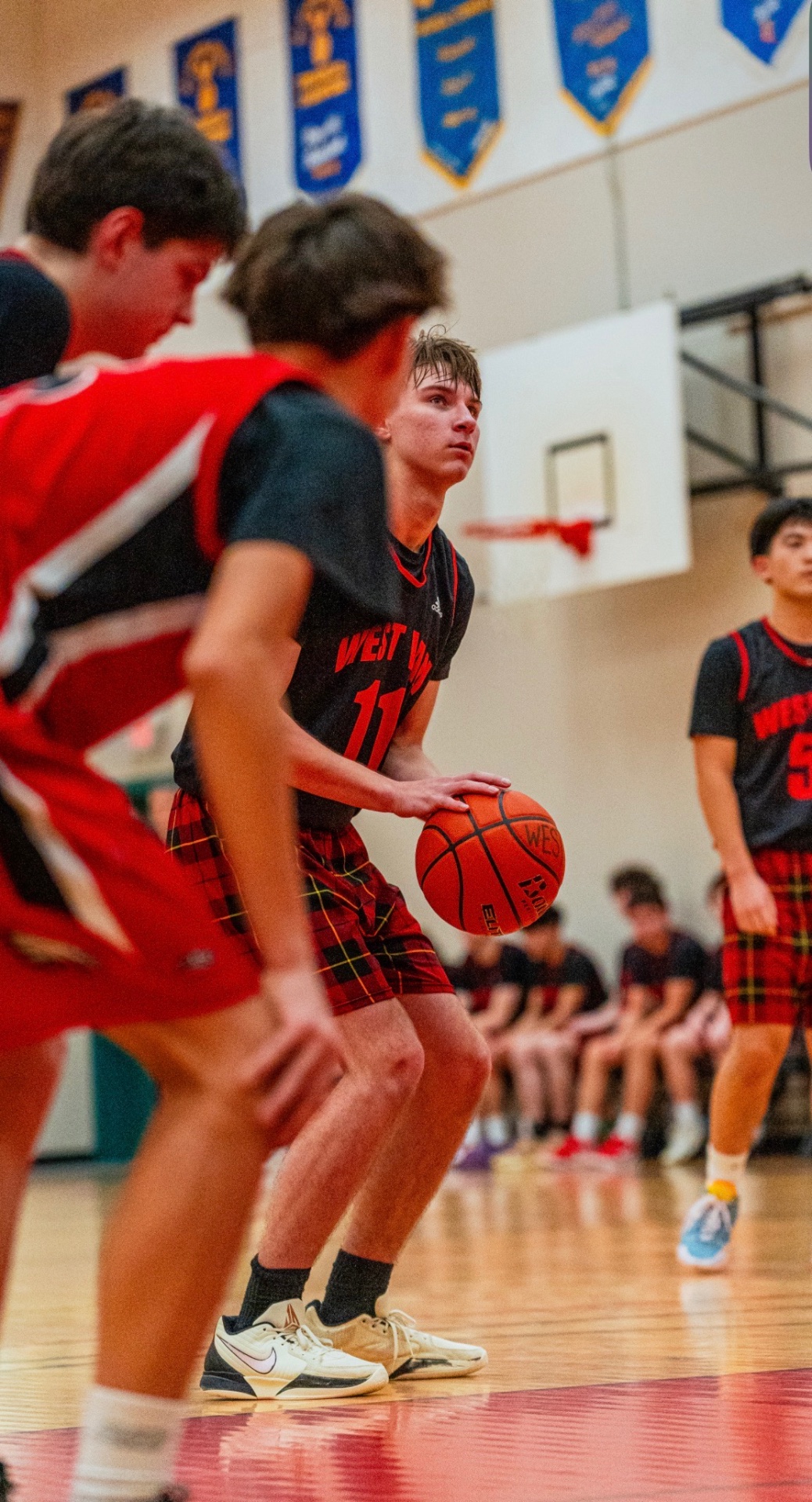 West Van #11 sizing up the defense